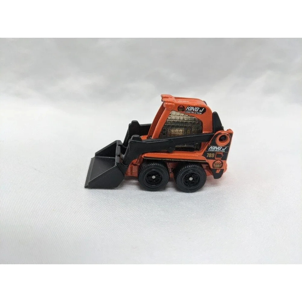 2009 Orange Matchbox Skidster Toy Mover Truck